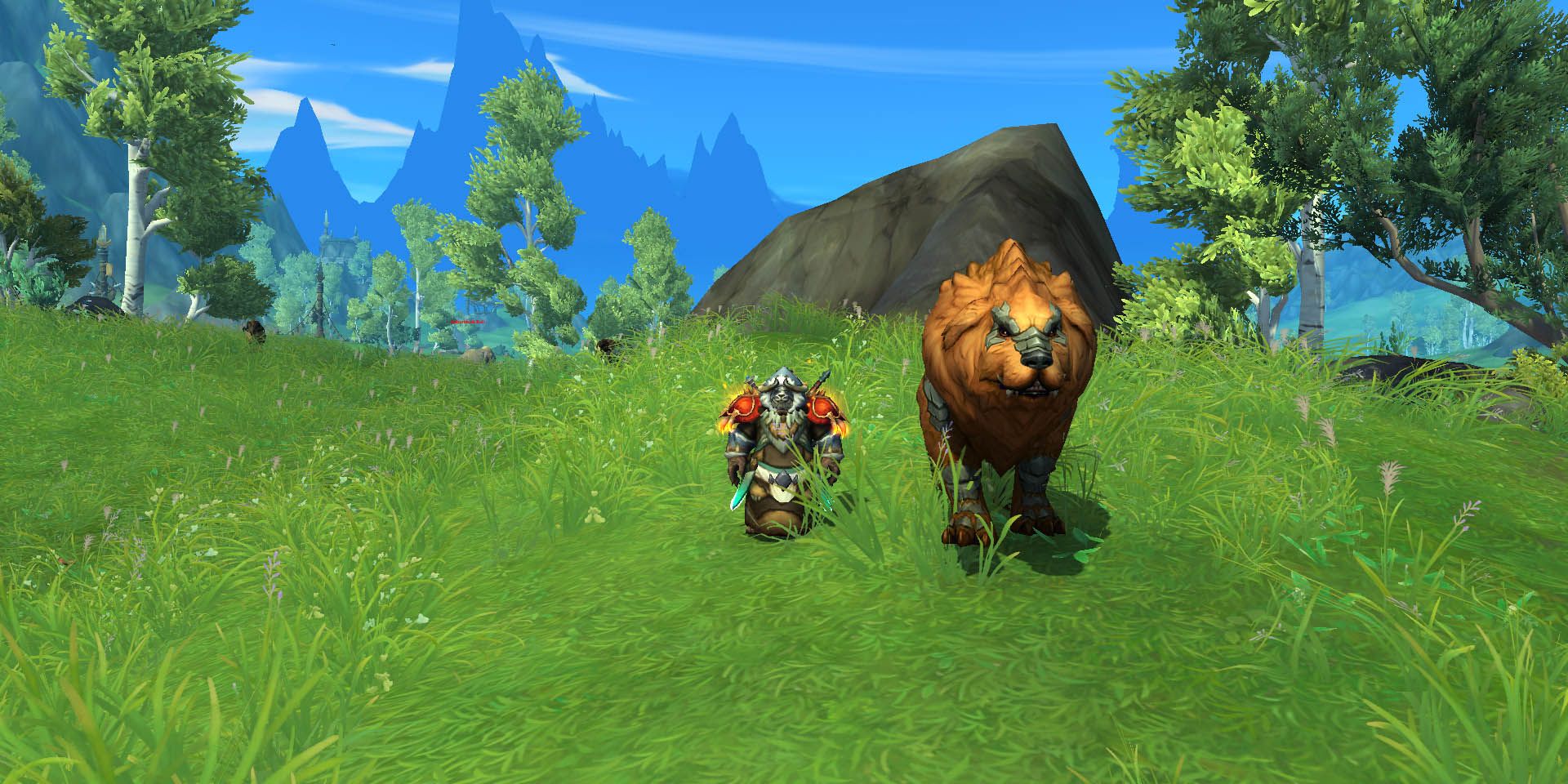 Uau: Um monge pandaren parado em um campo com um grande animal