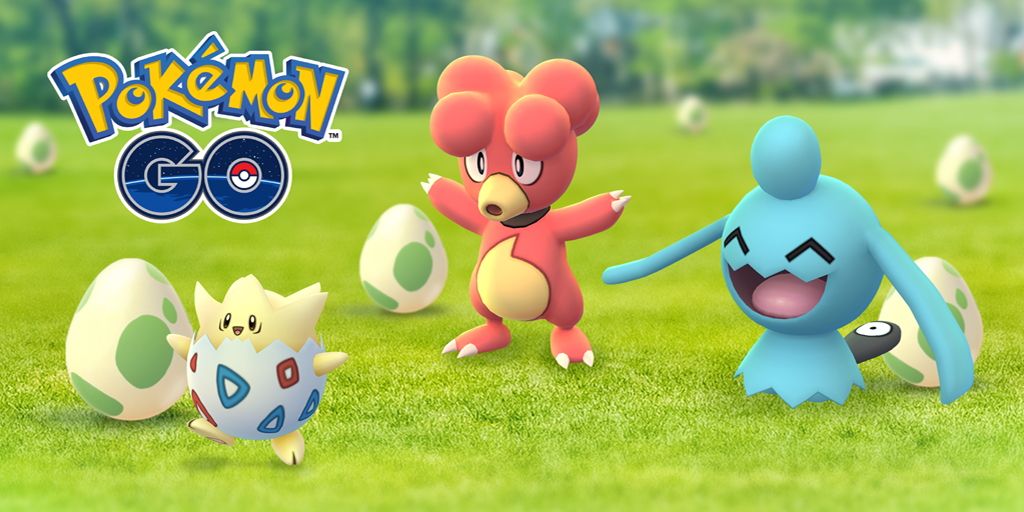 Togepi, Magby e Wynaut parados na frente de Eggs com o logotipo do Pokémon Go acima deles