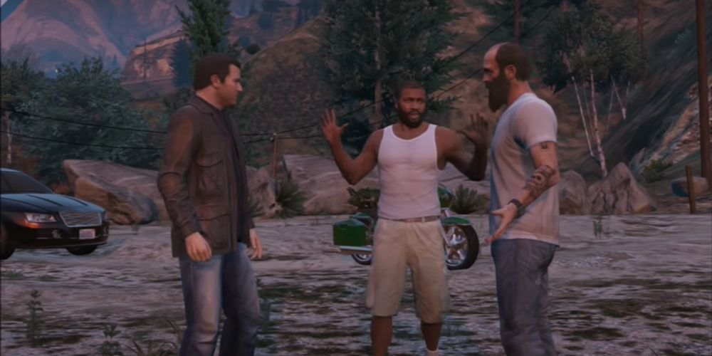 Mike, Franklin e Trevor conversam nas montanhas em GTA V