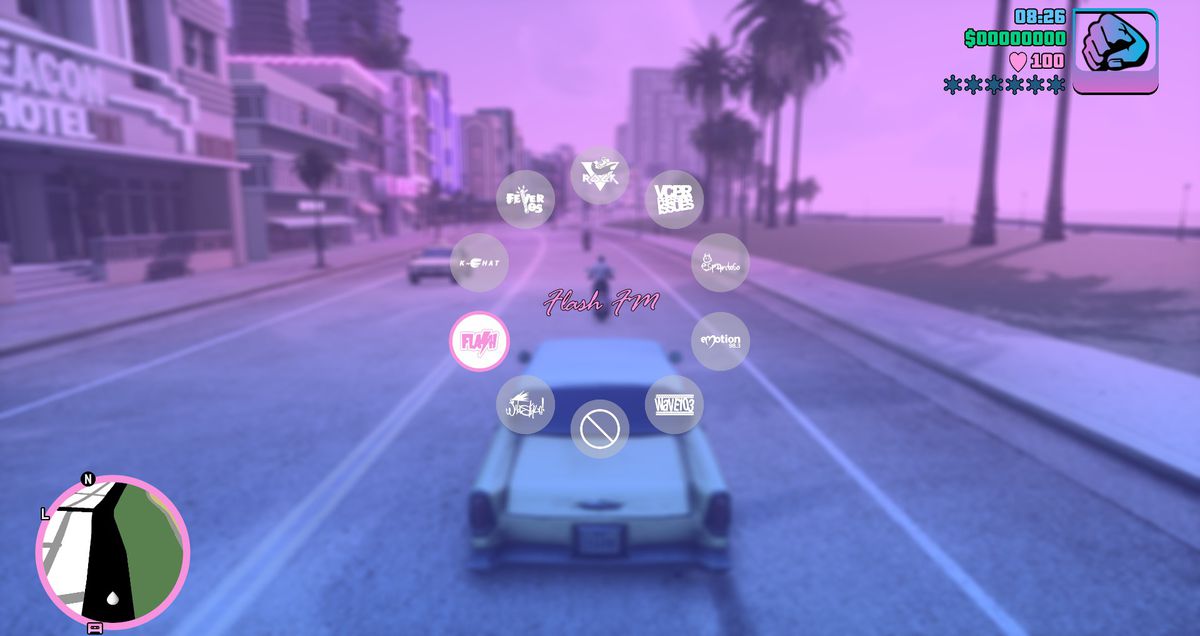 Uma pessoa dirige um carro por uma rodovia costeira na GTA Trilogy.
