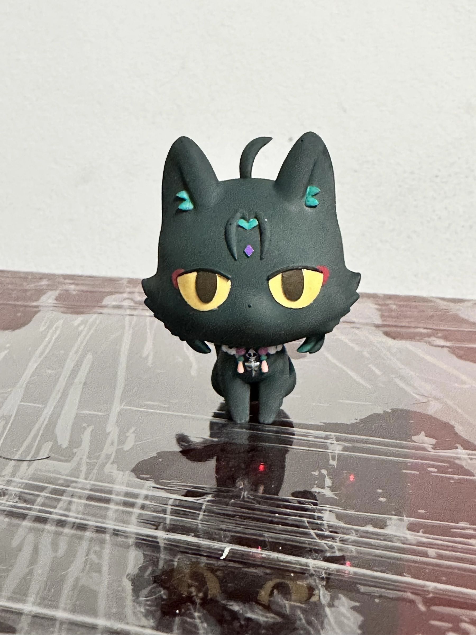 figura do gato xiao genshin impact