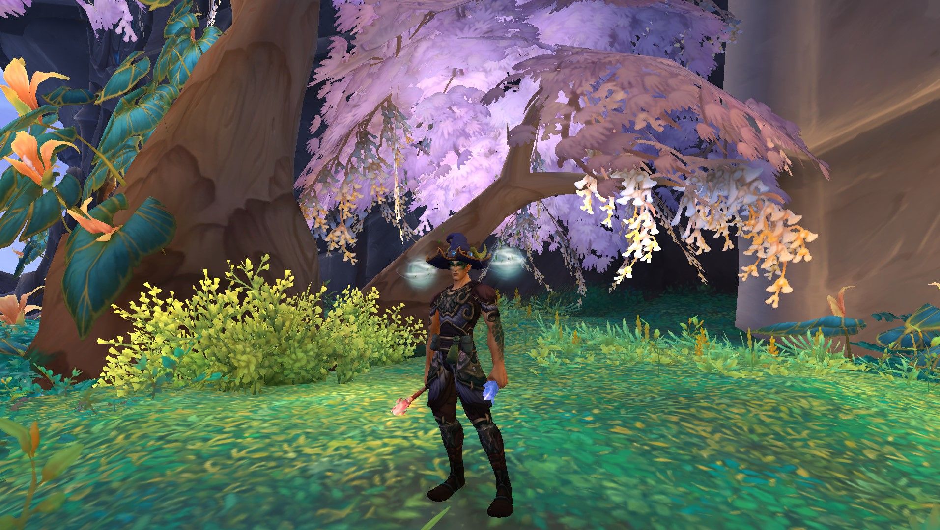 Um Evoker vestido como um Enchanter com ombreiras encantadas em World of Warcraft.