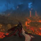 WoW 10.1 update - a shadow priest sitting on a dragonriding mount looks out over rivers of lava inside a huge cavern