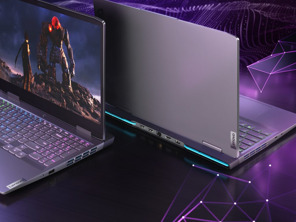 Dois laptops abertos de costas mostrando as portas