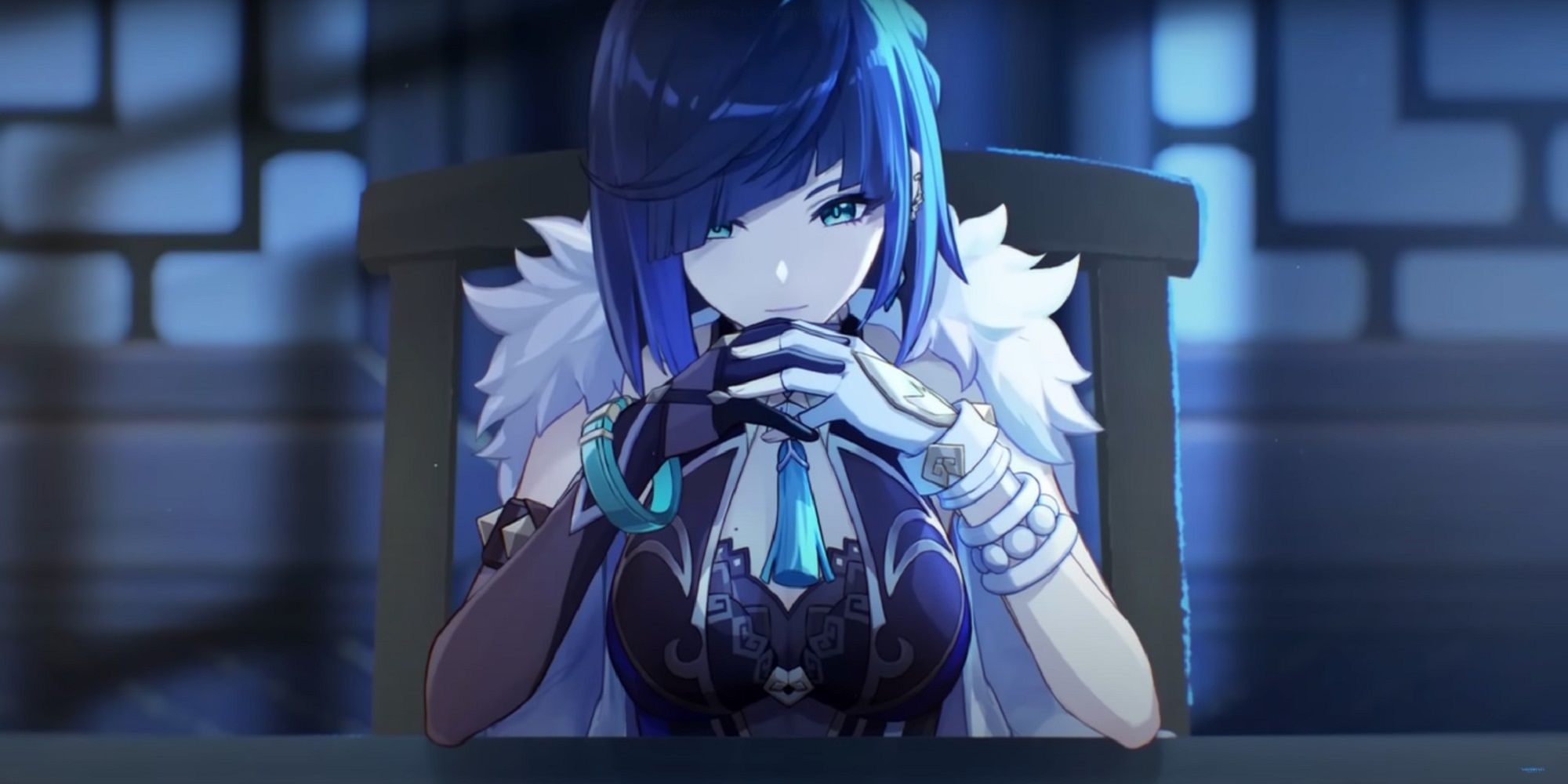 Yelan Teaser com as mãos dobradas sobre a mesa