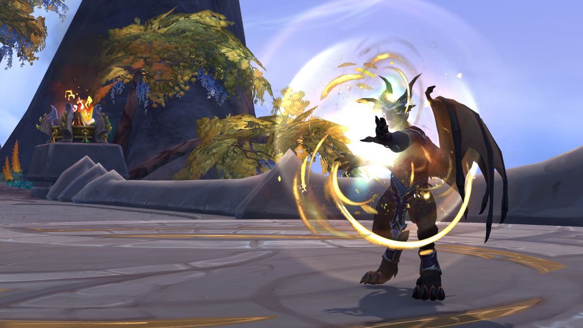 WoW 10.1.5 - an evoker is casting a swirly golden spell