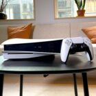 PS5 console and DualSense controller on a table