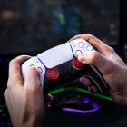 The new Juggernog Call of Duty thumbstick add-ons by Kontrolfreek attached to a PlayStation 5 controller.